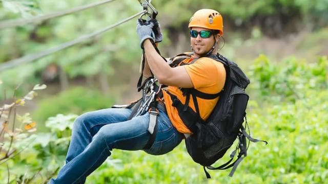 From San Juan: Zipline & Toro Bike Tour with Transportation