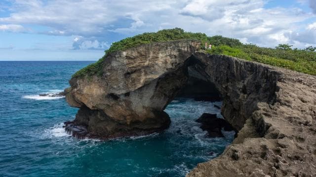 From San Juan: Cave of the Taino Indian Trek and Beach Tour