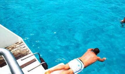 Party Boat Catamaran Excursion with snorkeling, BBQ & music