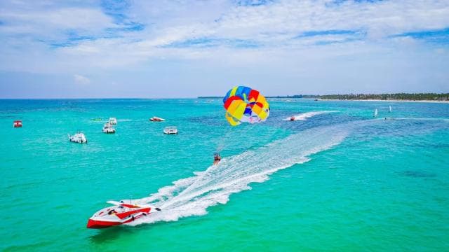 Punta Cana Area: Party Cruise with Parasailing and Open Bar