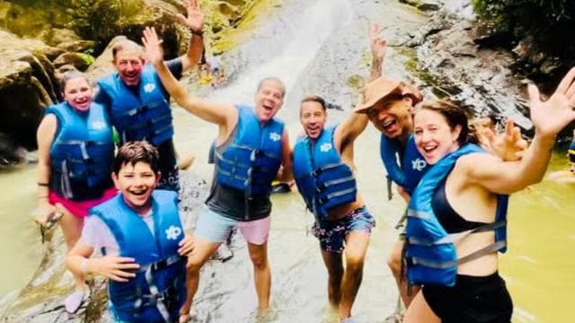 San Juan: Rainforest Waterslides & Beach Tour with Transport