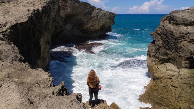 From San Juan: Cave of the Taino Indian Trek and Beach Tour