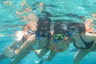 Party Boat Catamaran Excursion with snorkeling, BBQ & music