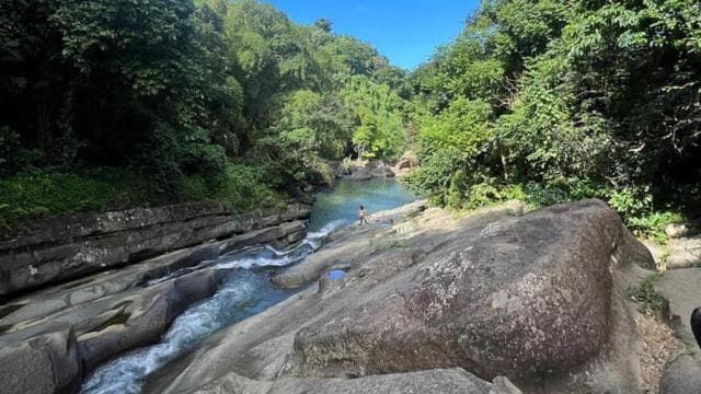San Juan: El Yunque Waterslide & Waterfall Tour with Snacks